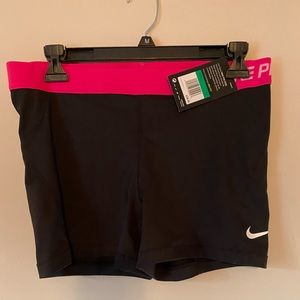 Nike pro, black legs with hot pink waistband